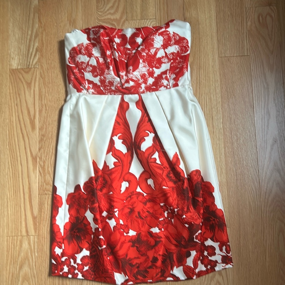 Silk lined strapless dress with boning.